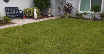text lawn in front of a house